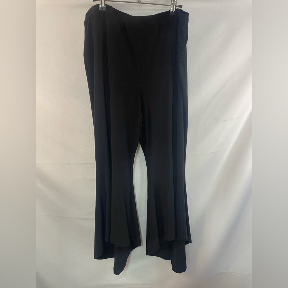 John Mark travel wear slacks wit the cutest pant legs! So flirty and comfy!